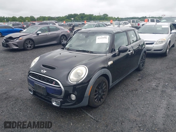 2015 MINI Hardtop 4 Door S with VIN WMWXU3C55F2B56429, listed as a IAAI auction lot 42335996 with 114,781 mi miles and . Bid and sale history available at DreamBid. Image 2.