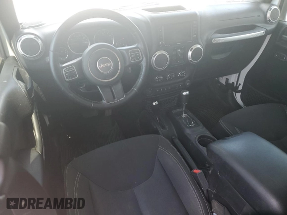 2016 Jeep Wrangler Unlimited Sahara with VIN 1C4BJWEG6GL182794, listed as a Copart auction lot 57880725 with 127,752 mi miles and Salvage title. Bid and sale history available at DreamBid. Image 8.