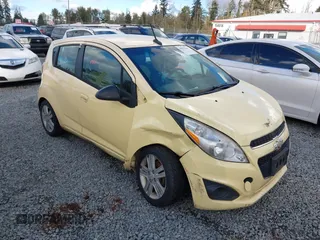 2013 Chevrolet Spark LS with VIN KL8CB6S95DC569607, listed as a IAAI auction lot 40552244 with 97,843 mi miles. Bid and sale history available at carsss.com. Image 1.