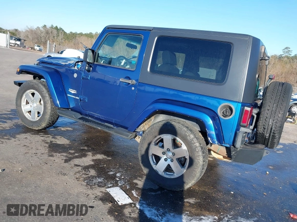 2009 Jeep Wrangler Sahara z VIN 1J4FA54199L722192, wystawiony jako IAAI lot #41619305 z przebiegiem 105 545 mil mil oraz . Historia ofert i sprzedaży dostępna na DreamBid. Obrazek 3.