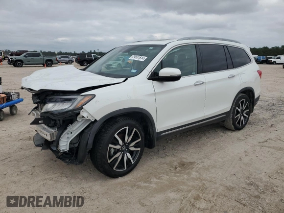 2021 Honda Pilot Touring 8-Passenger with VIN 5FNYF5H90MB001805, listed as a Copart auction lot 79101514 with 41,607 mi miles and Salvage Title. Bid and sale history available at DreamBid. Image 1.