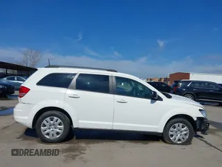 2019 Dodge Journey SE Value with VIN 3C4PDCAB1KT868065, listed as a IAAI auction lot 41642318 with 97,735 mi miles and . Bid and sale history available at DreamBid. Image 14.