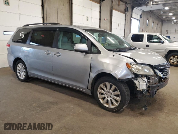 2012 Toyota Sienna XLE with VIN 5TDDK3DC2CS031088, listed as a Copart auction lot 60642845 with 186,586 mi miles and Salvage title. Bid and sale history available at DreamBid. Image 4.