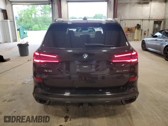2021 BMW X5 xDrive45e with VIN 5UXTA6C02M9F45757, listed as a Copart auction lot 61991985 with 65,162 mi miles and Salvage title. Bid and sale history available at DreamBid. Image 6.