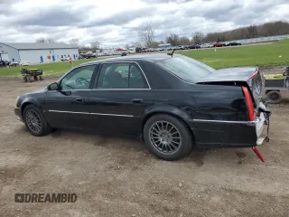 2007 Cadillac DTS Performance with VIN 1G6KD57937U201301, listed as a Copart auction lot 52868565 with 119,972 mi miles and Salvage Title. Bid and sale history available at carsss.com. Image 2.