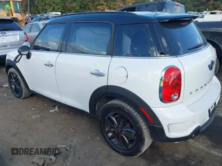 2015 MINI Countryman S with VIN WMWZC3C5XFWT06360, listed as a IAAI auction lot 40774863 with 127,383 mi miles and . Bid and sale history available at DreamBid. Image 3.