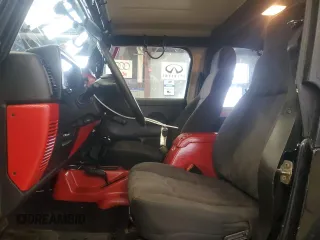 2004 Jeep Wrangler Sport with VIN 1J4FA49S64P722986, listed as a Copart auction lot 51840985 with 129,761 mi miles and Clean Title. Bid and sale history available at carsss.com. Image 7.