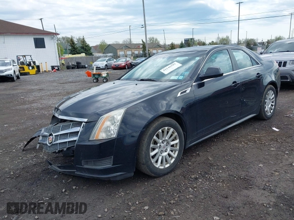 2011 Cadillac CTS z VIN 1G6DC5EY9B0153096, wystawiony jako IAAI lot #42146595 z przebiegiem 148 990 mil mil oraz . Historia ofert i sprzedaży dostępna na DreamBid. Obrazek 2.