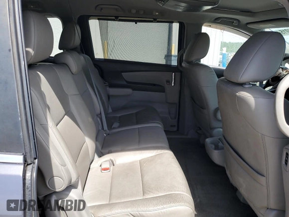 2015 Honda Odyssey EX-L z VIN 5FNRL5H69FB066576, wystawiony jako Copart lot #53834915 z przebiegiem 145 113 mil mil oraz Szkoda całkowita • Salvage title. Historia ofert i sprzedaży dostępna na DreamBid. Obrazek 10.