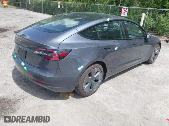 2023 Tesla Model 3 z VIN 5YJ3E1EA4PF461624, wystawiony jako IAAI lot #42433789 z przebiegiem 22 182 mil mil oraz . Historia ofert i sprzedaży dostępna na DreamBid. Obrazek 4.