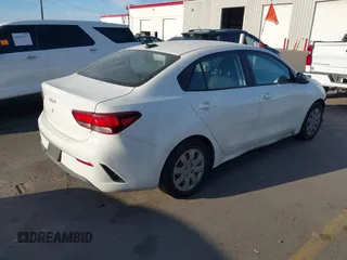 2022 Kia Rio S with VIN 3KPA24AD4NE498600, listed as a IAAI auction lot 40527357 with 59,614 mi miles and . Bid and sale history available at carsss.com. Image 4.