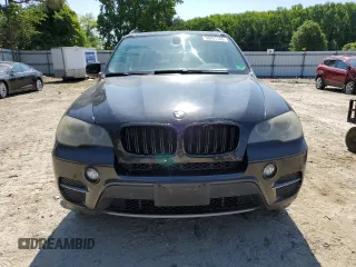 2012 BMW X5 35i z VIN 5UXZV4C52CL748838, wystawiony jako Copart lot #58051155 z przebiegiem 224 088 mil mil oraz Czysty tytuł • Clean title. Historia ofert i sprzedaży dostępna na DreamBid. Obrazek 5.