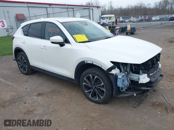 2022 Mazda CX-5 2.5 S Premium Plus Package with VIN JM3KFBEM2N0616960, listed as a IAAI auction lot 42127024 with 30,565 mi miles. Bid and sale history available at carsss.com. Image 1.