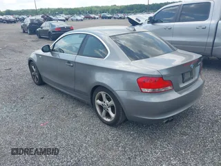 2011 BMW 1 Series 128i with VIN WBAUP9C57BVL90171, listed as a IAAI auction lot 42801051 with 150,148 mi miles and . Bid and sale history available at DreamBid. Image 3.