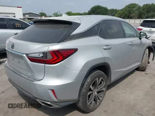 2017 Lexus RX 350 z VIN 2T2ZZMCAXHC052984, wystawiony jako IAAI lot #42273947 z przebiegiem 128 019 mil mil oraz . Historia ofert i sprzedaży dostępna na DreamBid. Obrazek 4.