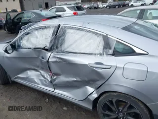 2019 Honda Civic Sport with VIN 2HGFC2F86KH548823, listed as a IAAI auction lot 41898140 with 39,907 mi miles and . Bid and sale history available at DreamBid. Image 6.