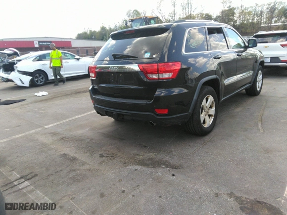 2011 Jeep Grand Cherokee Laredo with VIN 1J4RR4GTXBC538060, listed as a IAAI auction lot 41964694 with 152,999 mi miles. Bid and sale history available at carsss.com. Image 4.