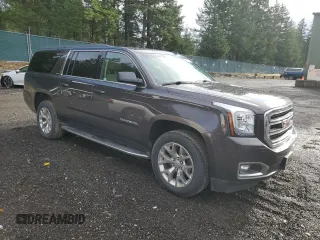 2015 GMC Yukon XL SLT with VIN 1GKS2HKC7FR282543, listed as a Copart auction lot 84996754 with 153,840 mi miles and Clean Title. Bid and sale history available at carsss.com. Image 4.
