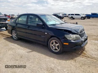 2002 Mitsubishi Lancer OZ-Rally z VIN JA3AJ86E32U001737, wystawiony jako Copart lot #59275695 z przebiegiem 177 332 mil mil oraz Szkoda całkowita • Salvage title. Historia ofert i sprzedaży dostępna na DreamBid. Obrazek 4.