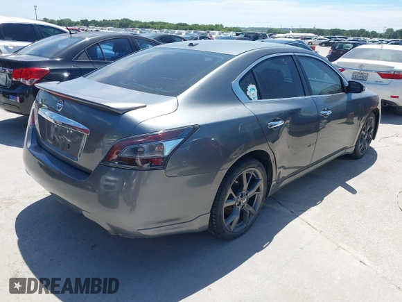 2014 Nissan Maxima SV z VIN 1N4AA5AP1EC440170, wystawiony jako IAAI lot #42837930 z przebiegiem 100 309 mil mil oraz . Historia ofert i sprzedaży dostępna na DreamBid. Obrazek 4.