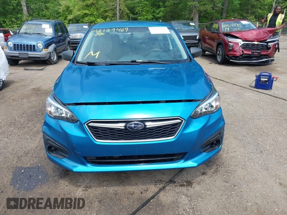 2018 Subaru Impreza with VIN 4S3GTAA69J3723926, listed as a IAAI auction lot 42129469 with 61,167 mi miles and . Bid and sale history available at DreamBid. Image 12.