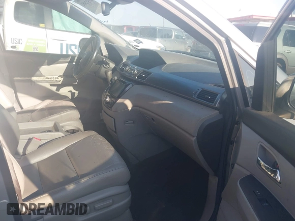 2014 Honda Odyssey EX-L with VIN 5FNRL5H64EB099175, listed as a IAAI auction lot 41522452 with 175,471 mi miles and . Bid and sale history available at carsss.com. Image 5.