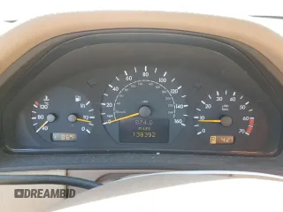 2000 Mercedes-Benz E-Class AWD with VIN WDBJH82J8YX042547, listed as a Copart auction lot 58063494 with 138,392 mi miles and Salvage Title. Bid and sale history available at carsss.com. Image 9.