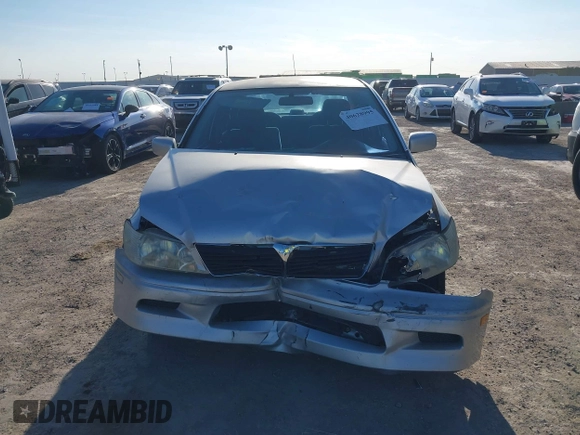 2002 Mitsubishi Lancer LS with VIN JA3AJ36E22U035784, listed as a IAAI auction lot 40628995 with 1 mi miles. Bid and sale history available at carsss.com. Image 6.