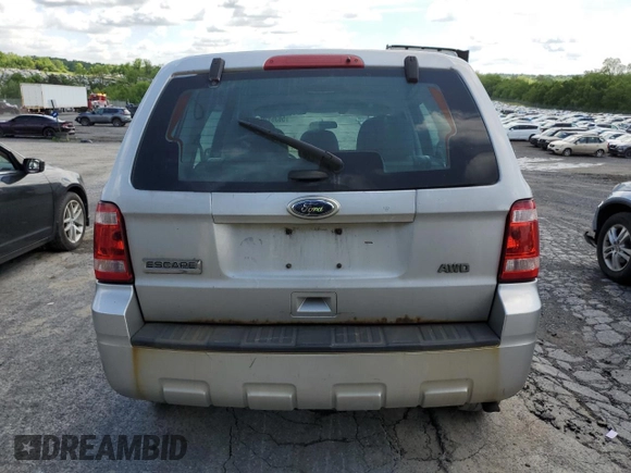 2012 Ford Escape XLS с VIN 1FMCU9C75CKB93460, выставлен на аукционе Copart как лот 56351295 с пробегом 361 381 миль миль и Списание • Salvage title. История ставок и продаж доступна на DreamBid. Изображение 6.