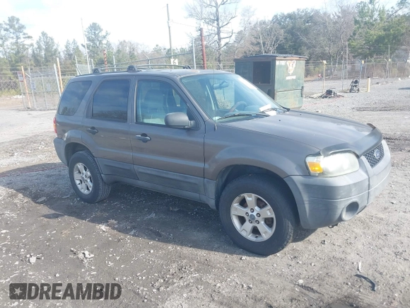 2006 Ford Escape XLT with VIN 1FMYU03Z56KC55074, listed as a IAAI auction lot 41473454 with 164,399 mi miles. Bid and sale history available at carsss.com. Image 1.