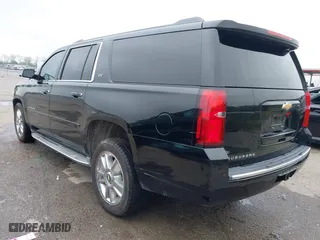 2015 Chevrolet Suburban LTZ with VIN 1GNSCKKC6FR271675, listed as a IAAI auction lot 41915036 with 150,917 mi miles. Bid and sale history available at carsss.com. Image 3.