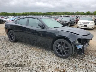 2021 Dodge Charger SXT with VIN 2C3CDXBG6MH613055, listed as a Copart auction lot 52149655 with 86,396 mi miles and Salvage Title. Bid and sale history available at carsss.com. Image 4.
