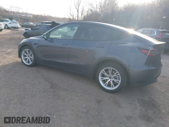 2023 Tesla Model Y Long Range with VIN 7SAYGAEEXPF612231, listed as a IAAI auction lot 41758243 with 32,924 mi miles and . Bid and sale history available at DreamBid. Image 3.