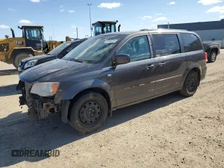 2014 Dodge Grand Caravan American Value with VIN 2C4RDGBG3ER189688, listed as a Copart auction lot 53849235 with 239,916 mi miles and Clean Title. Bid and sale history available at DreamBid. Image 1.