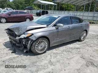 2013 Ford Fusion Titanium Hybrid with VIN 3FA6P0RU0DR317557, listed as a Copart auction lot 57828135 with Not provided miles and Salvage title. Bid and sale history available at DreamBid. Image 1.