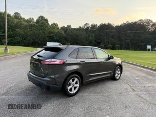 2020 Ford Edge SE с VIN 2FMPK3G9XLBB11099, выставлен на аукционе Copart как лот 66417805 с пробегом 119 223 миль миль и Чистый • Clean title. История ставок и продаж доступна на DreamBid. Изображение 4.