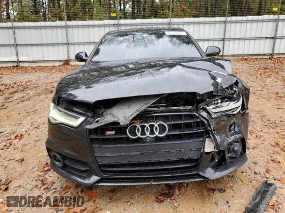 2016 Audi S6 Prestige z VIN WAUH2AFC8GN131045, wystawiony jako Copart lot #80532794 z przebiegiem 98 827 mil mil oraz Szkoda całkowita • Salvage title. Historia ofert i sprzedaży dostępna na DreamBid. Obrazek 5.