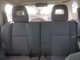 2003 Chevrolet Tracker with VIN 2CNBE13C836953178, listed as a Copart auction lot 60715605 with 128,978 mi miles and Salvage title. Bid and sale history available at DreamBid. Image 10.