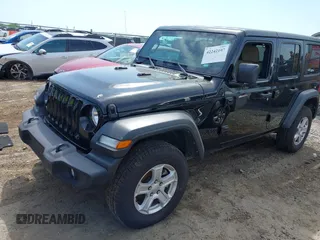 2023 Jeep Wrangler Sport S with VIN 1C4HJXDN6PW599895, listed as a IAAI auction lot 42242107 with 53,980 mi miles and . Bid and sale history available at DreamBid. Image 17.