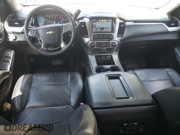 2015 Chevrolet Suburban LT с VIN 1GNSCJKC5FR254778, выставлен на аукционе Copart как лот 62424055 с пробегом 179 219 миль миль и Списание • Salvage title. История ставок и продаж доступна на DreamBid. Изображение 8.