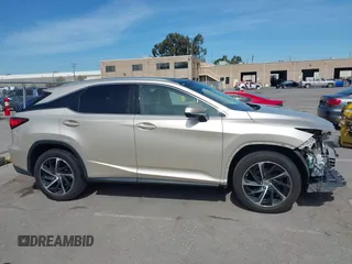 2016 Lexus RX 350 with VIN 2T2BZMCA3GC025934, listed as a IAAI auction lot 41885055 with 111,472 mi miles and . Bid and sale history available at DreamBid. Image 14.