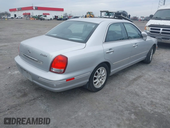 2002 Hyundai XG L z VIN KMHFU45EX2A228865, wystawiony jako IAAI lot #41421493 z przebiegiem 97 138 mil mil oraz . Historia ofert i sprzedaży dostępna na DreamBid. Obrazek 4.