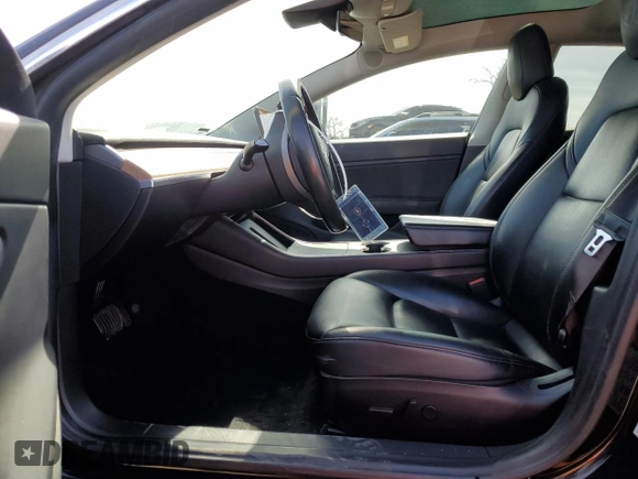 2019 Tesla Model 3 Mid Range with VIN 5YJ3E1EAXKF311719, listed as a Copart auction lot 44570825 with 143,034 mi miles and Salvage Title. Bid and sale history available at carsss.com. Image 7.