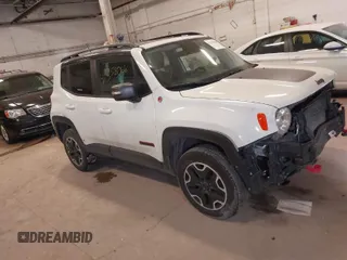 2017 Jeep Renegade Trailhawk z VIN ZACCJBCB6HPG61492, wystawiony jako IAAI lot #41358066 z przebiegiem 162 340 mil mil oraz . Historia ofert i sprzedaży dostępna na DreamBid. Obrazek 1.