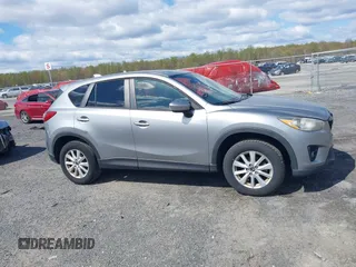 2013 Mazda CX-5 Touring with VIN JM3KE4CE5D0125470, listed as a IAAI auction lot 42051475 with 277,077 mi miles. Bid and sale history available at carsss.com. Image 13.