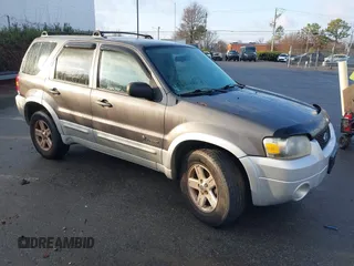 2006 Ford Escape Hybrid with VIN 1FMYU96H26KA19747, listed as a IAAI auction lot 41496607 with 247,629 mi miles and . Bid and sale history available at DreamBid. Image 1.