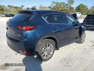 2021 Mazda CX-5 Grand Touring with VIN JM3KFADM9M0401778, listed as a Copart auction lot 46227515 with 44,587 mi miles and Non Repairable. Bid and sale history available at carsss.com. Image 3.