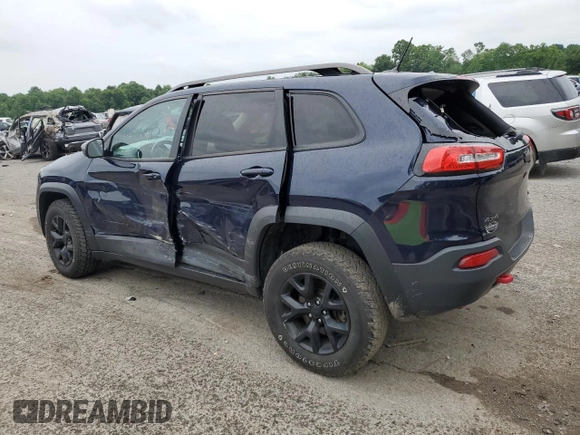 2015 Jeep Cherokee Trailhawk with VIN 1C4PJMBB8FW740452, listed as a Copart auction lot 63023715 with 96,236 mi miles and Salvage title. Bid and sale history available at DreamBid. Image 2.