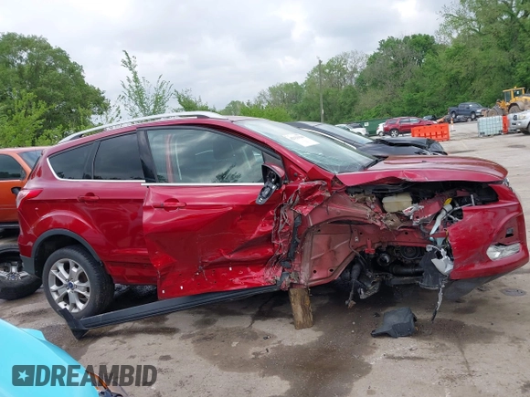 2016 Ford Escape Titanium with VIN 1FMCU9JX0GUA29353, listed as a IAAI auction lot 42133326 with 143,892 mi miles and . Bid and sale history available at DreamBid. Image 14.
