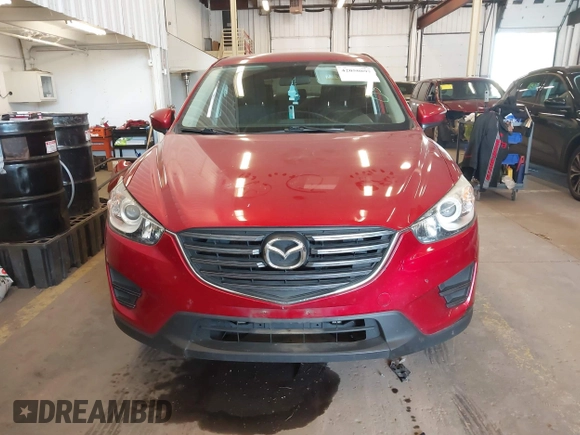 2016 Mazda CX-5 Sport z VIN JM3KE2BY3G0684861, wystawiony jako IAAI lot #42050897 z przebiegiem 165 688 mil mil oraz . Historia ofert i sprzedaży dostępna na DreamBid. Obrazek 13.
